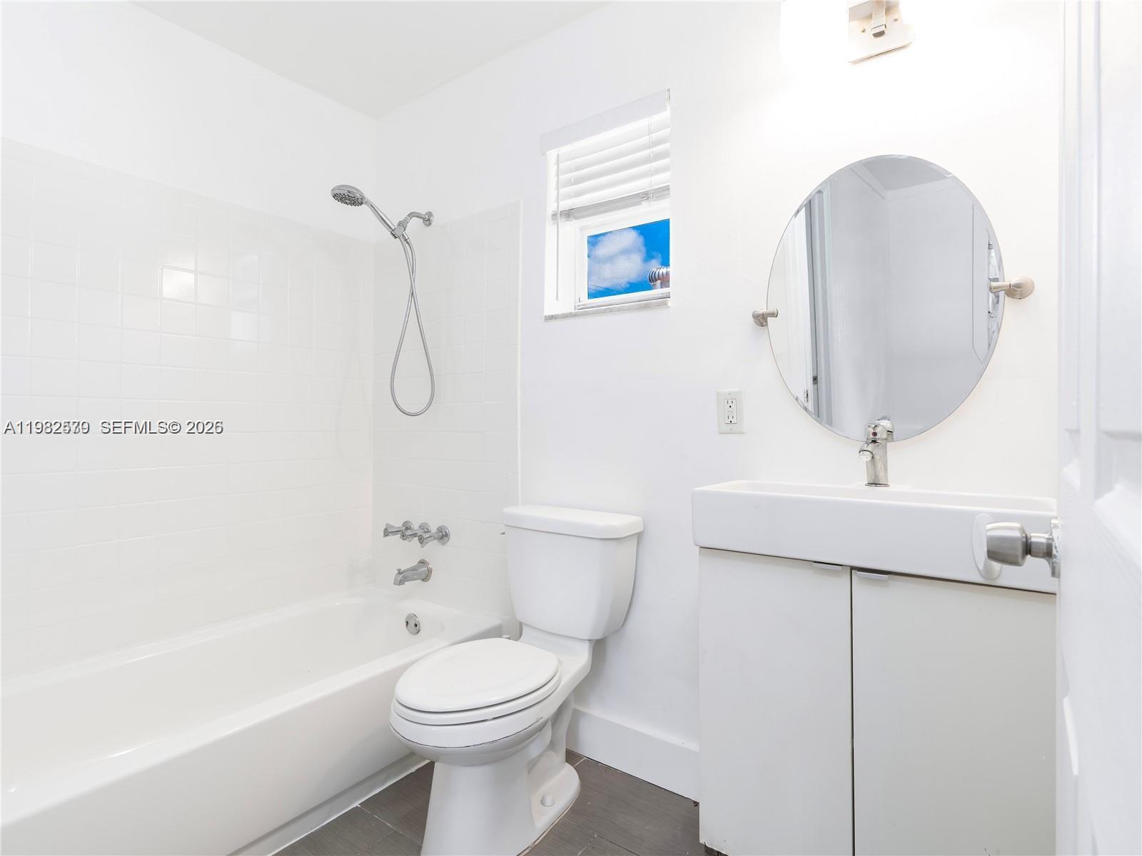 2020 Miami Road, Unit B Fort Lauderdale, FL 33316 - Photo 9 of 9 a bathroom with a sink a toilet and shower