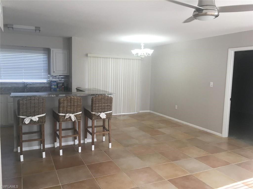 1023 Illinois Drive Naples, FL 34103 - Photo 4 of 14 Dining reaPICTURE TAKEN PRIOR TO TENANT