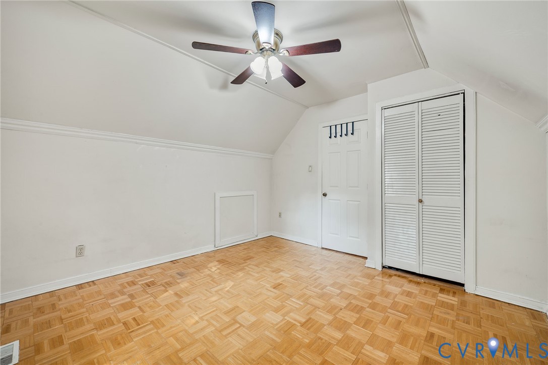 4820 Cedar Cliff Road Chester, VA 23831 - Photo 29 of 41 Vaulted ceiling with ceiling fan, wood-finish floo