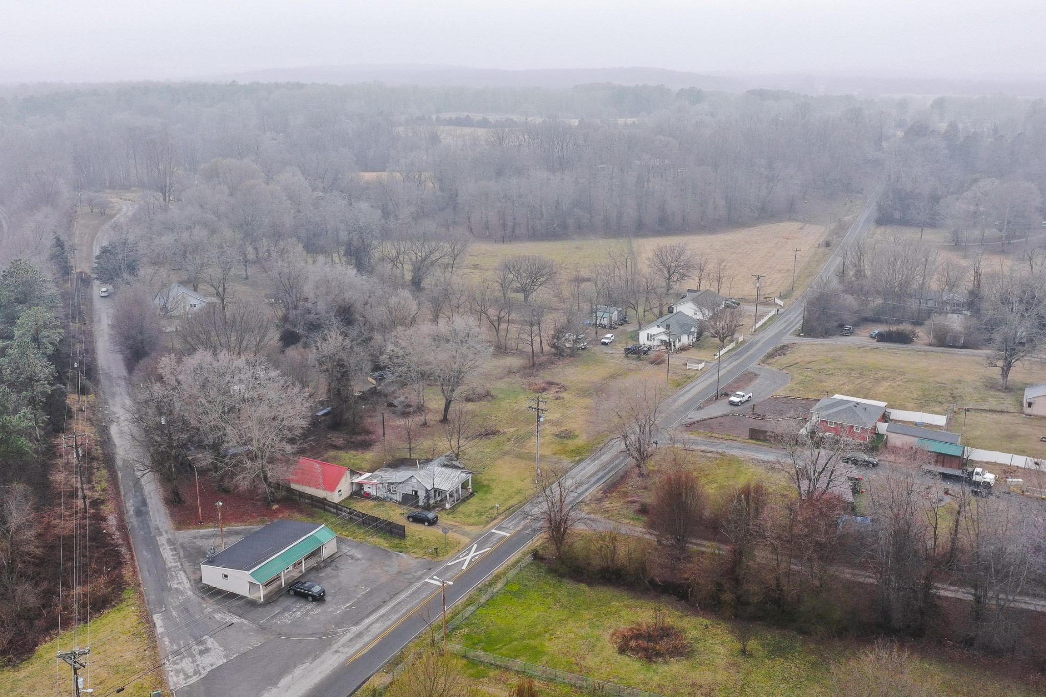 9311 Missionary Ridge Road Bon Aqua, TN 37025 - Photo 7 of 7 an aerial view of residential houses with outdoor space