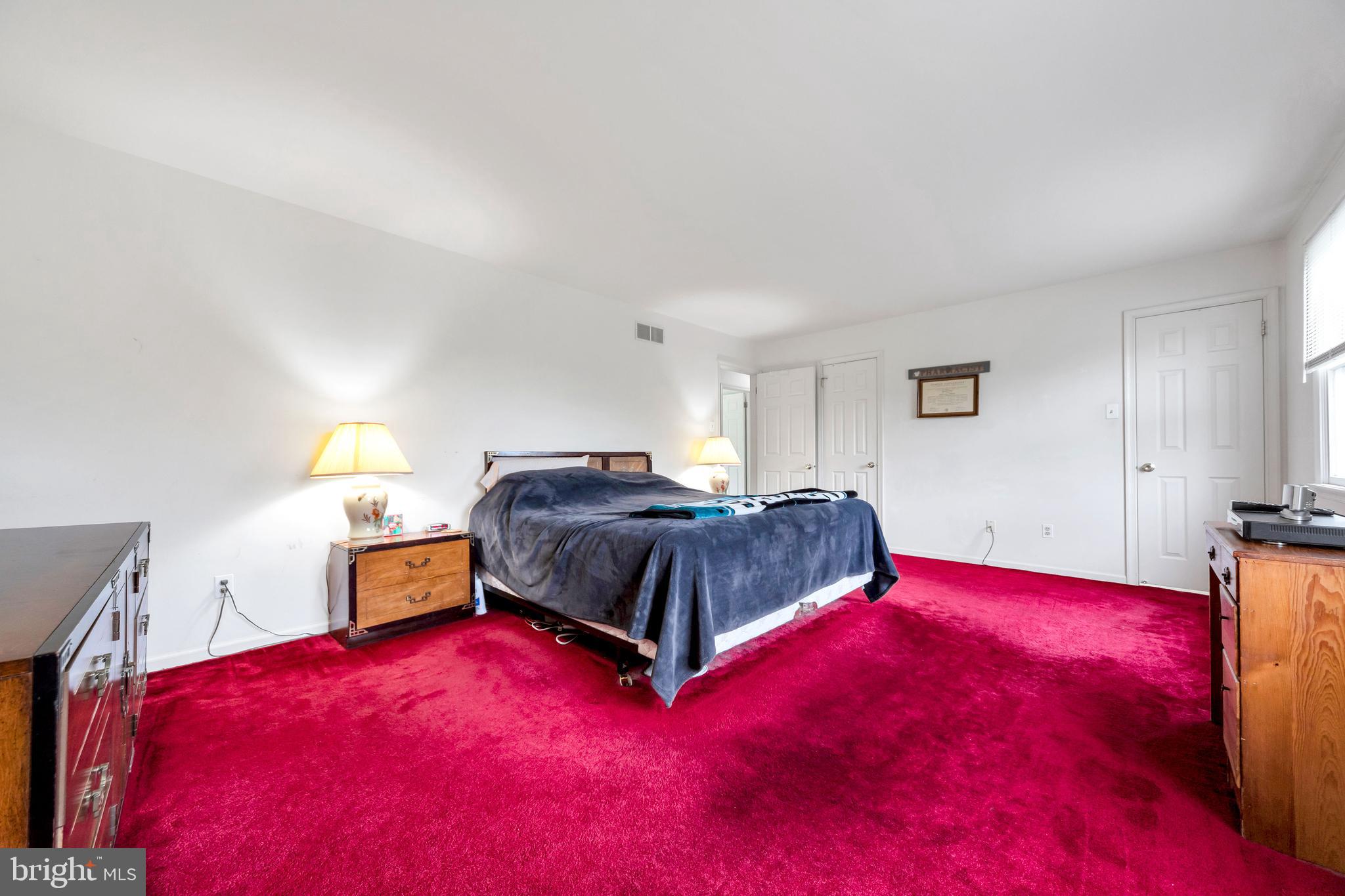1072 Independence Way Hatfield, PA 19440 - Photo 27 of 37 a bedroom with a bed and a lamp