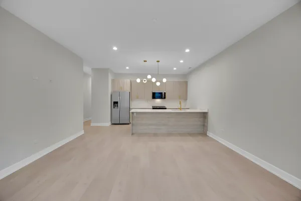 a view of kitchen and kitchen island