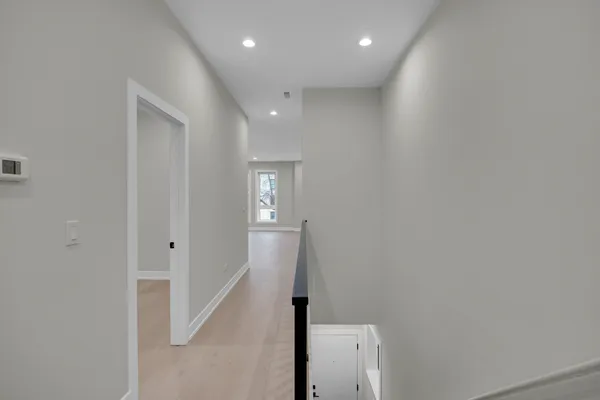 a view of hallway with stairs