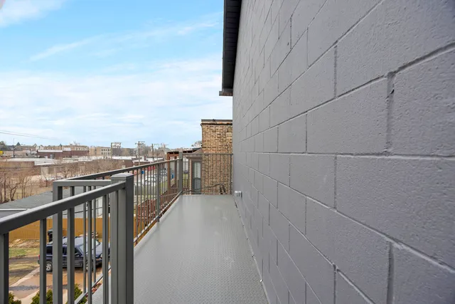 a view of balcony with city