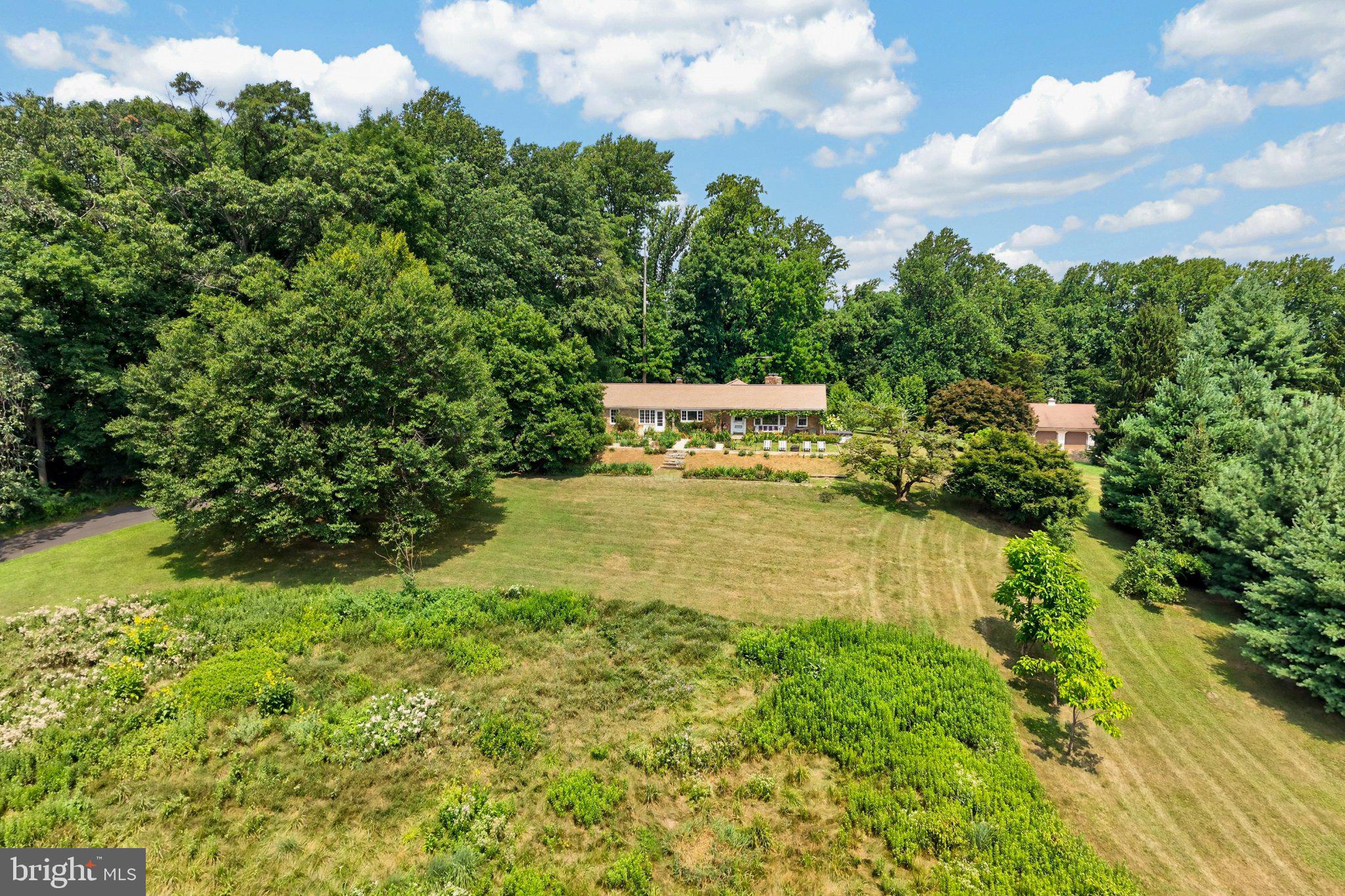 1015 Chester Springs Road Phoenixville, PA 19460 - Photo 50 of 68 Serene home nestled in lush greenery.