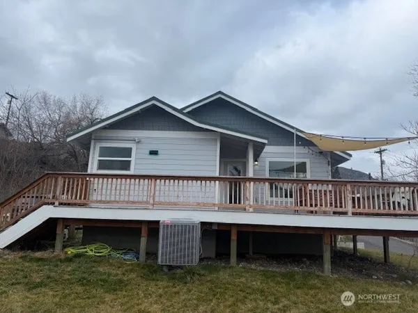a view of a house with a roof deck