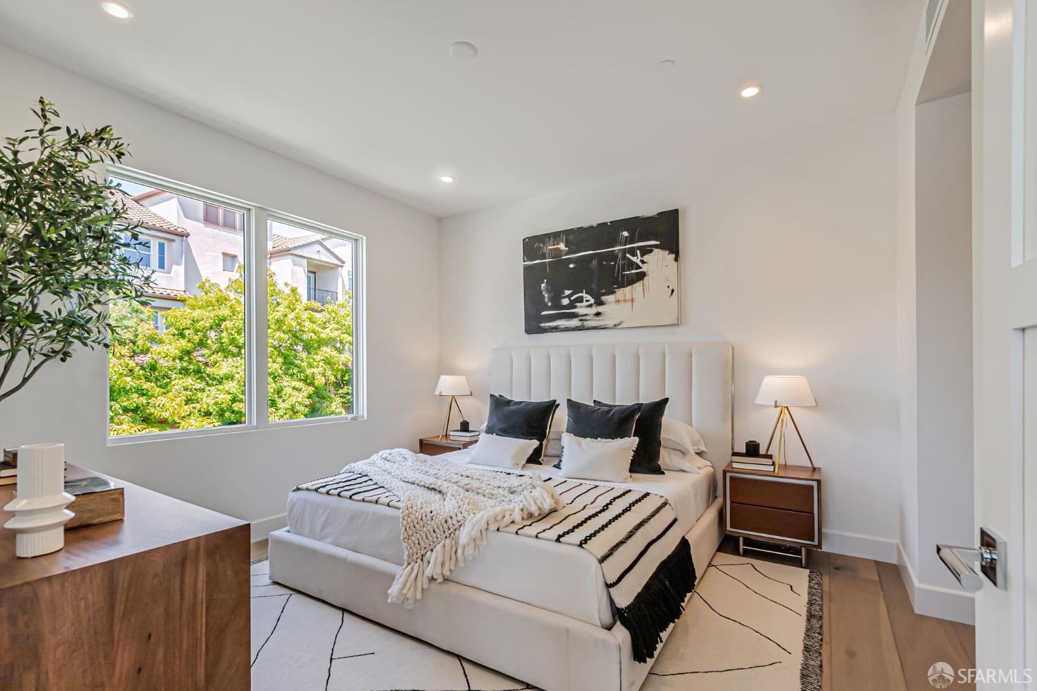 425 1st Street, Unit 21 Los Altos, CA 94022 - Photo 14 of 41 a bedroom with a bed and a window