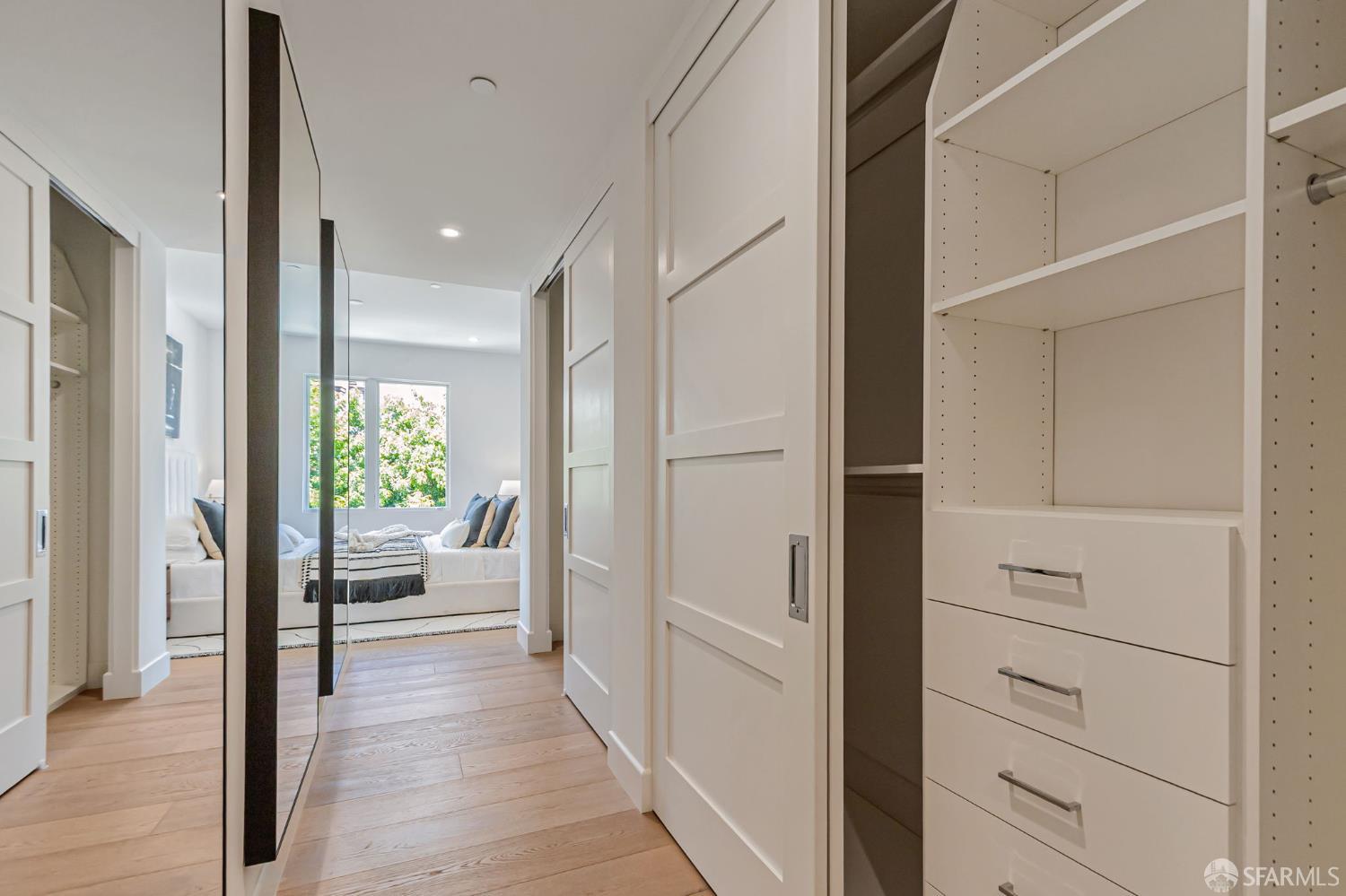 425 1st Street, Unit 21 Los Altos, CA 94022 - Photo 22 of 41 a view of a hallway to a bedroom and wooden floor