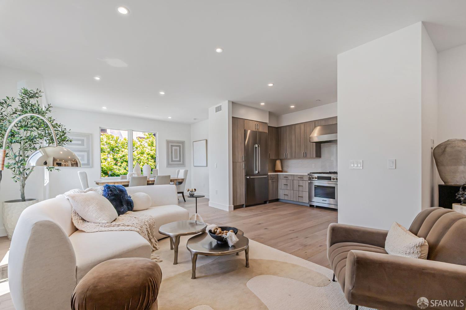 425 1st Street, Unit 21 Los Altos, CA 94022 - Photo 5 of 41 a living room with furniture and a large window
