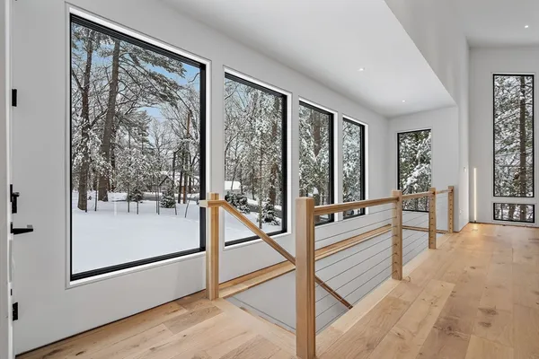a view of a house with a snow in front of it