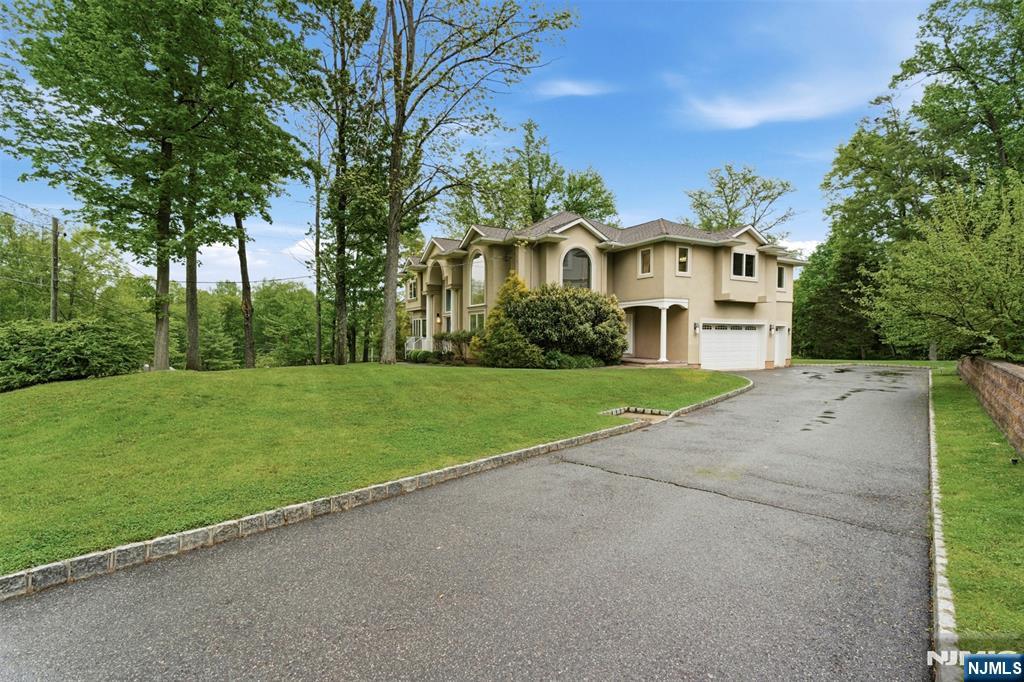 767 Orangeburgh Road River Vale, NJ 07675 - Photo 3 of 49 a view of a house with a big yard and large trees
