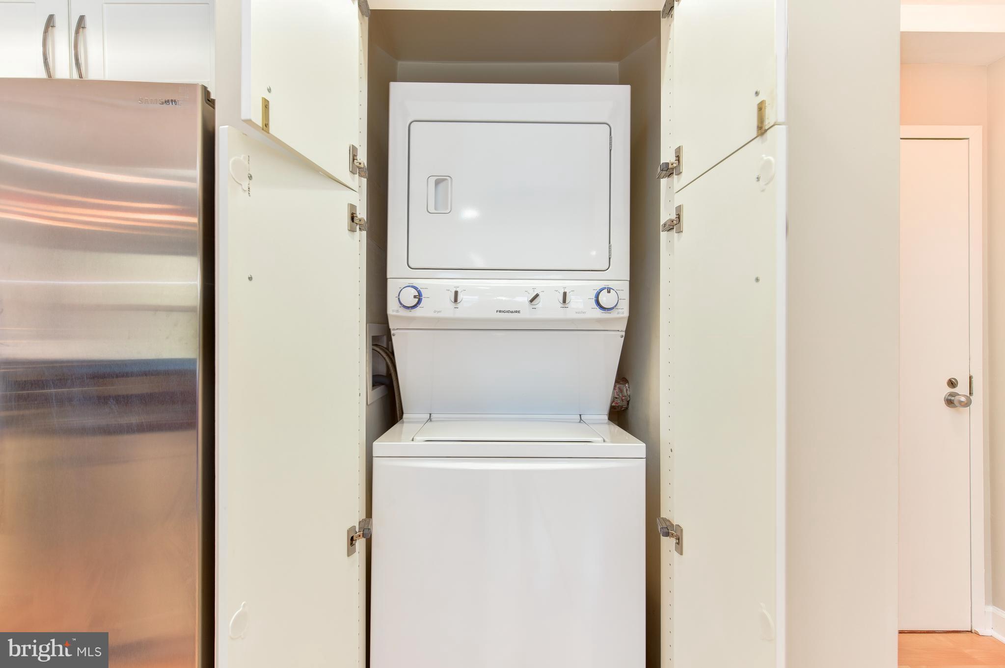 2440 16th Street Northwest, Unit 412 Washington, DC 20009 - Photo 16 of 25 a utility room with dryer and washer