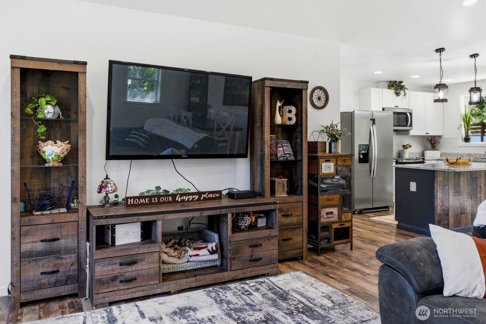 690 North Summit Road McCleary, WA 98557 - Photo 25 of 40 a living room with furniture and flat screen tv
