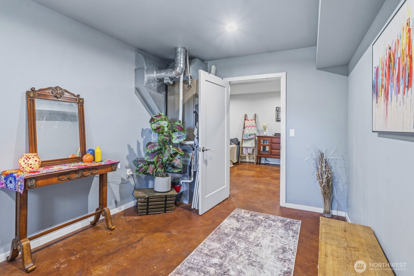690 North Summit Road McCleary, WA 98557 - Photo 10 of 40 a living room with furniture and a potted plant