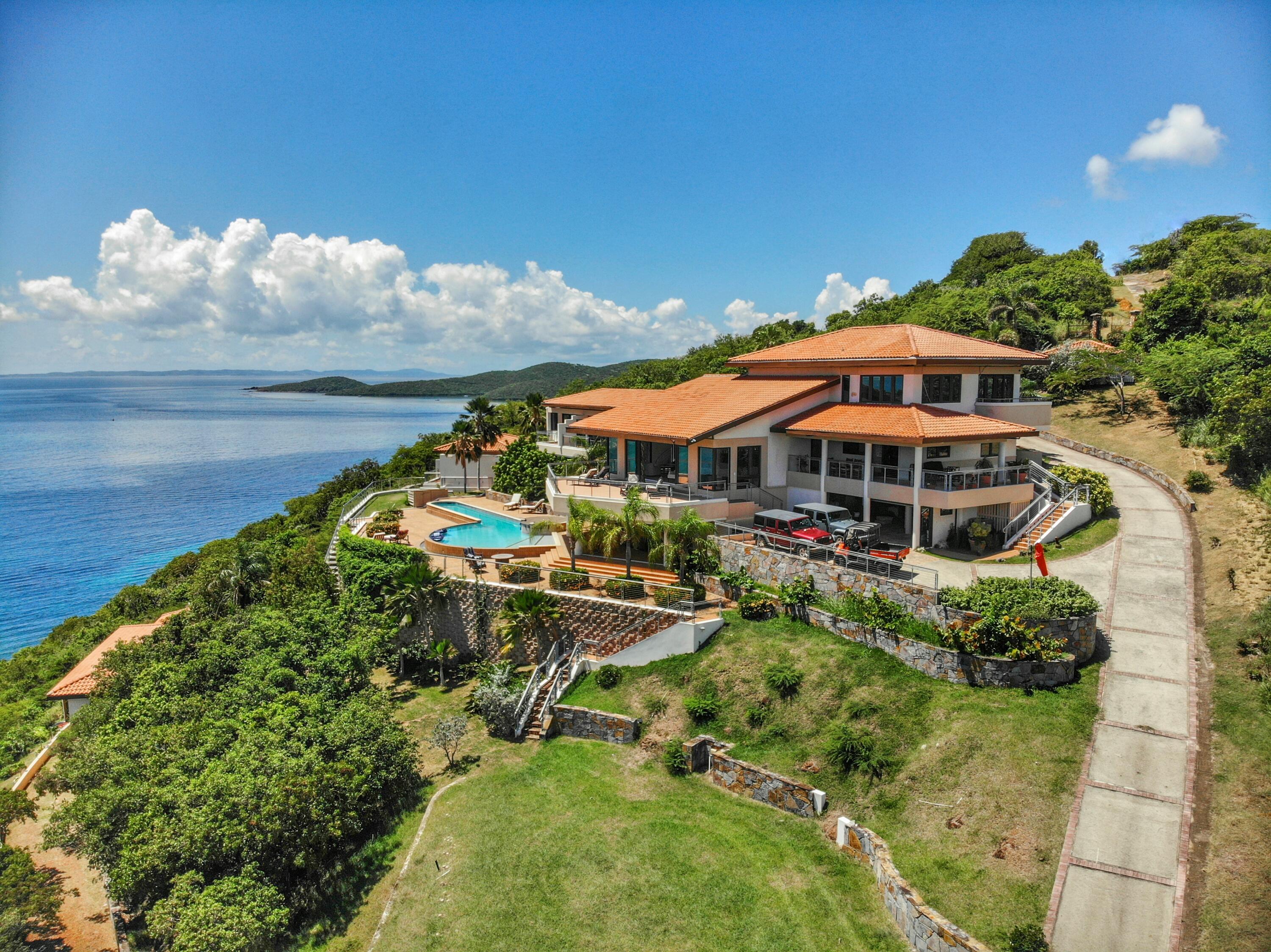 1 Southeast Harbor Estates Culeba, PR 00775 - Photo 1 of 56 an aerial view of a house with a yard