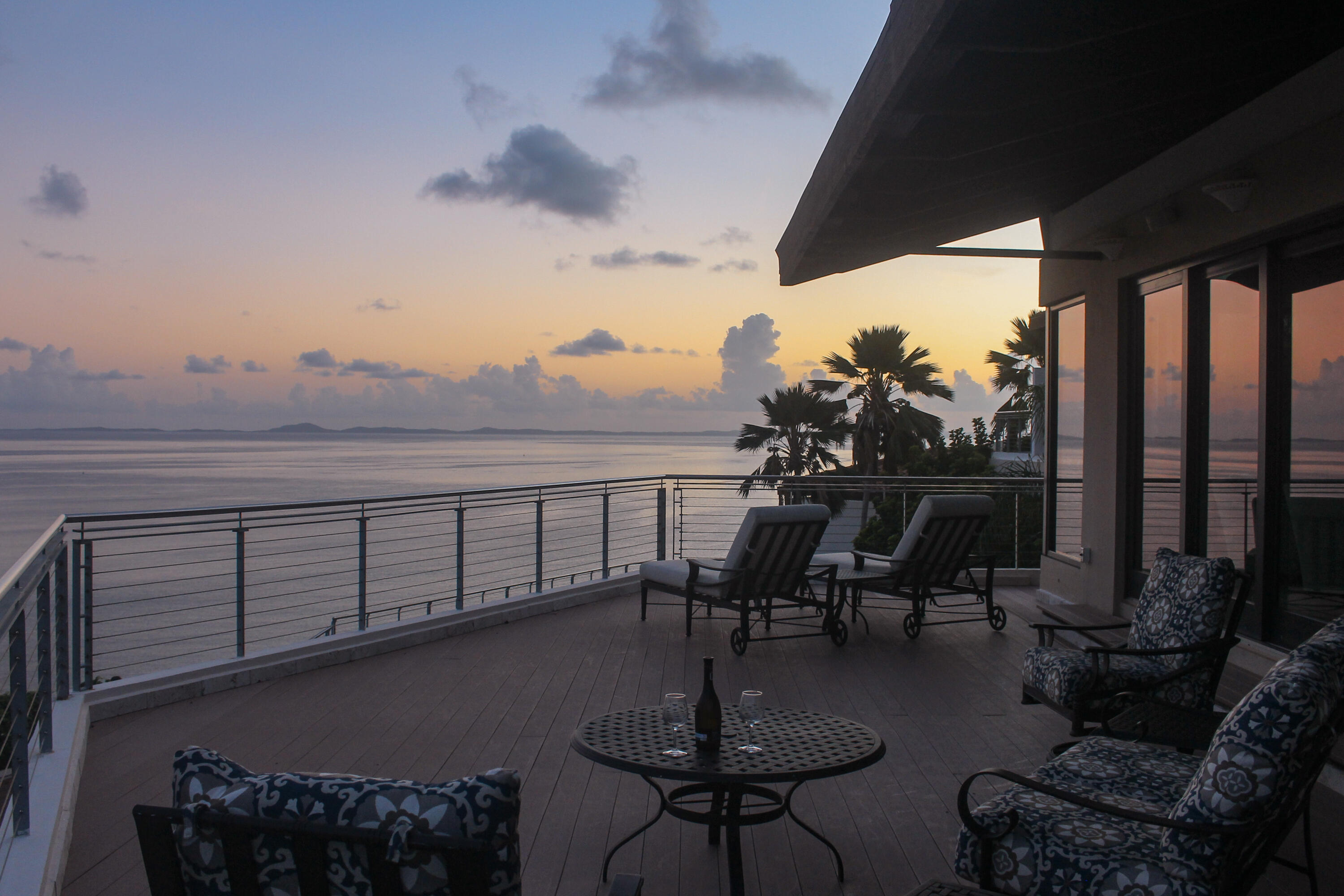 1 Southeast Harbor Estates Culeba, PR 00775 - Photo 11 of 56 a view of a balcony with chairs and wooden floor