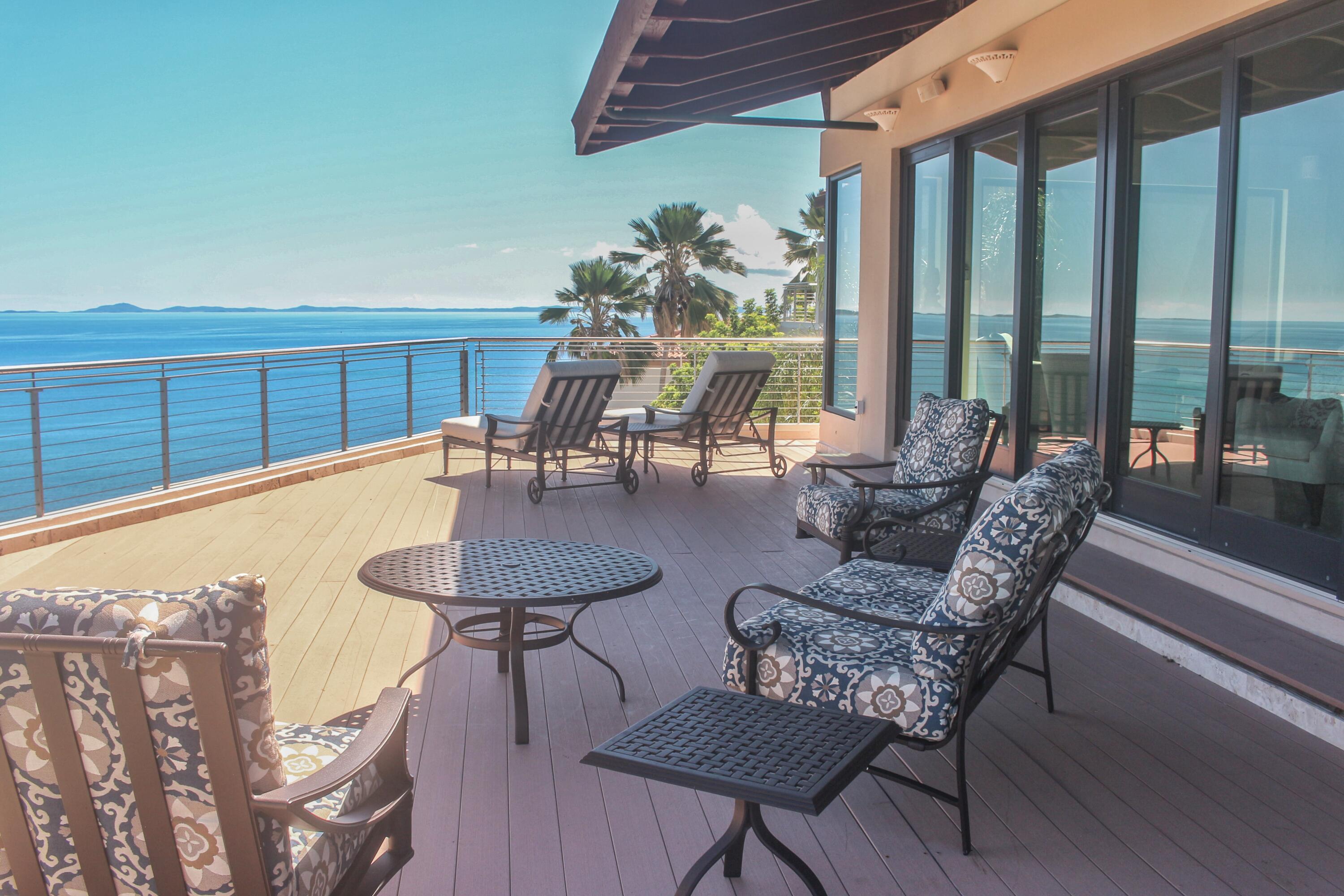 1 Southeast Harbor Estates Culeba, PR 00775 - Photo 17 of 56 a living room with furniture a table and a large window