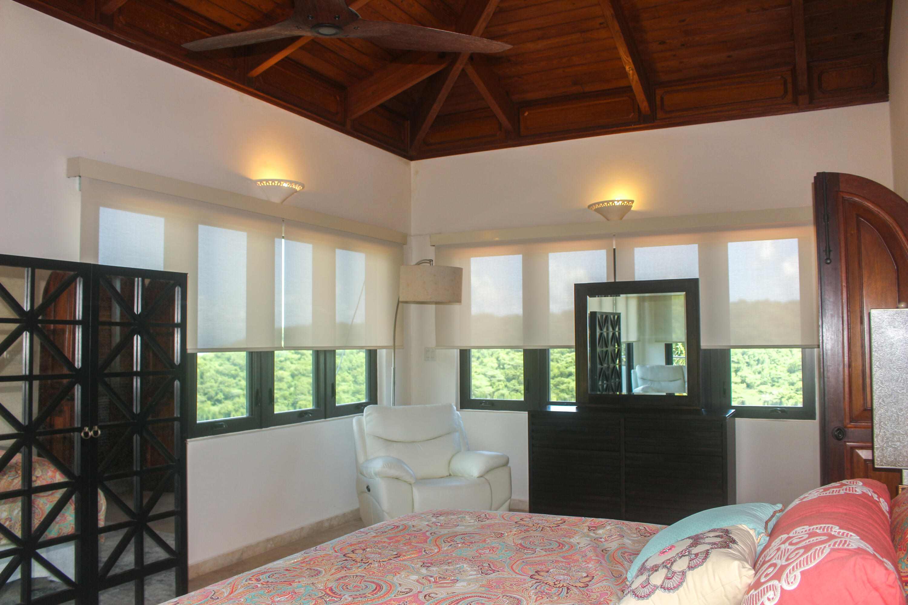 1 Southeast Harbor Estates Culeba, PR 00775 - Photo 23 of 56 a bedroom with a bed a dresser and windows