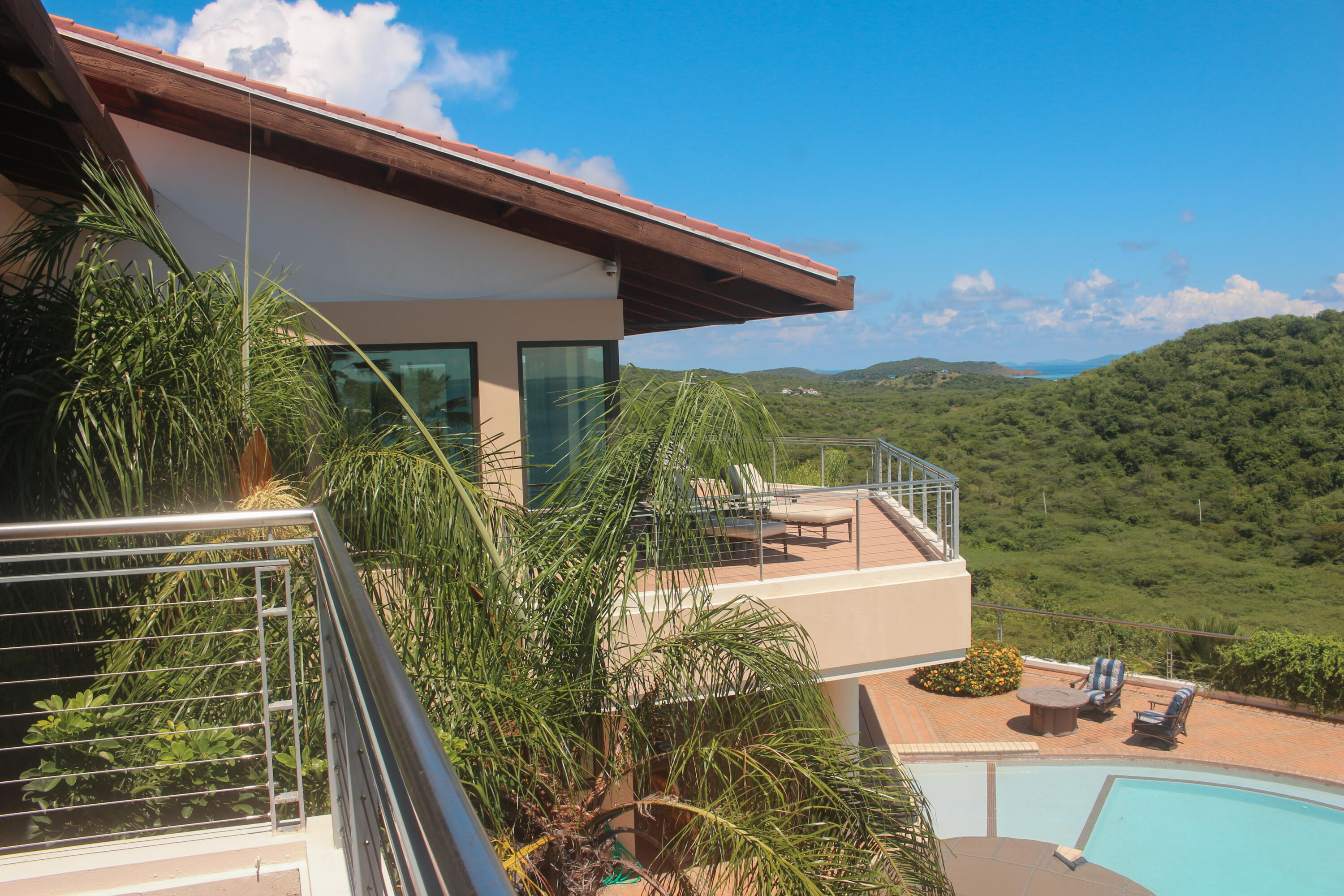1 Southeast Harbor Estates Culeba, PR 00775 - Photo 26 of 56 a balcony with table and chairs and potted plants