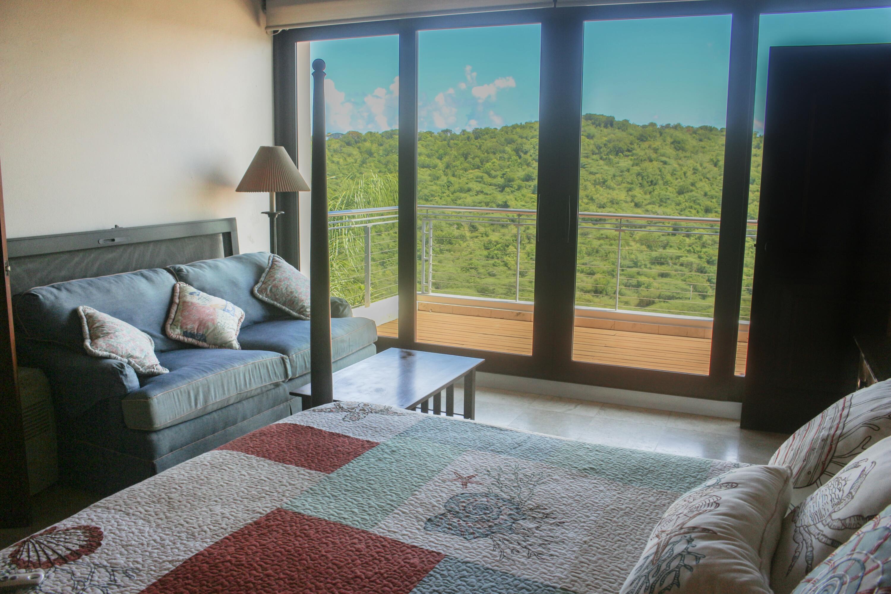 1 Southeast Harbor Estates Culeba, PR 00775 - Photo 30 of 56 a bedroom with furniture and a large window