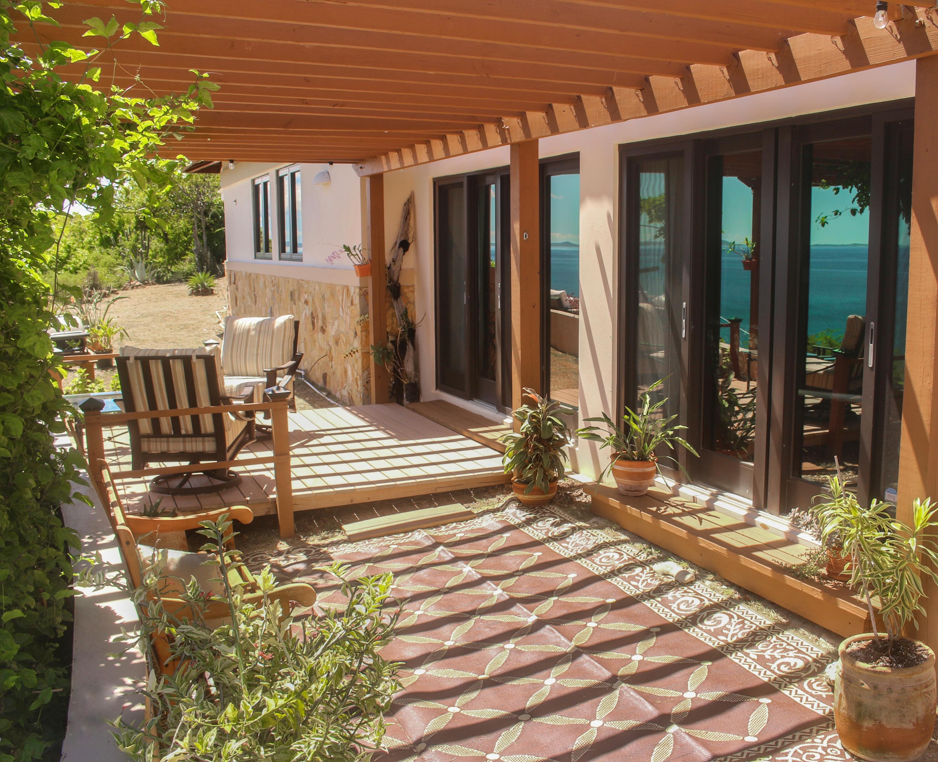 1 Southeast Harbor Estates Culeba, PR 00775 - Photo 41 of 56 a view of a house with backyard and porch