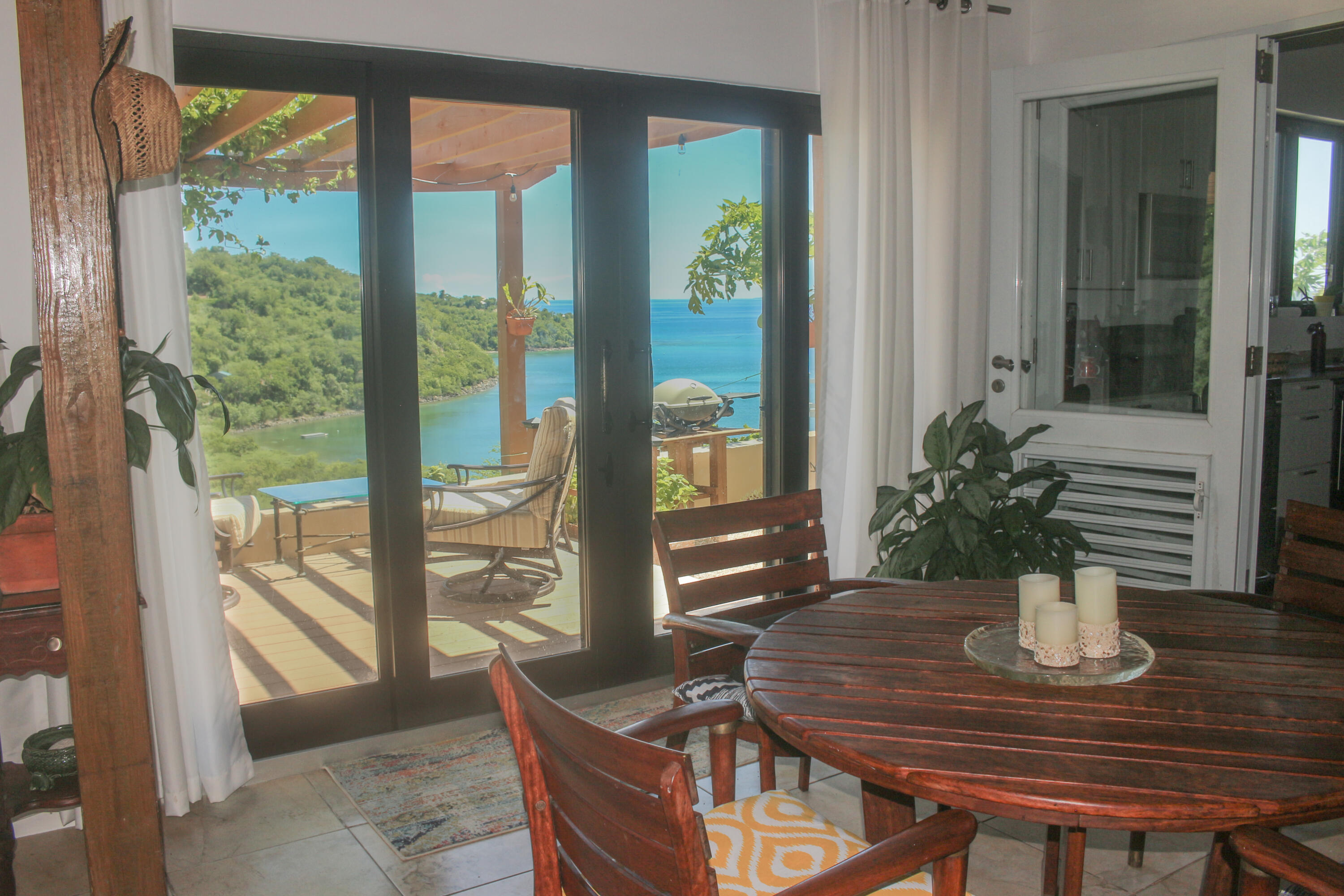 1 Southeast Harbor Estates Culeba, PR 00775 - Photo 44 of 56 a view of a dining room with furniture window and wooden floor