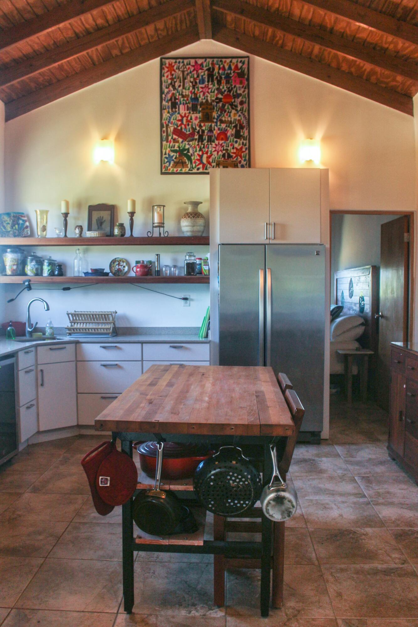 1 Southeast Harbor Estates Culeba, PR 00775 - Photo 47 of 56 a kitchen with a table chairs sink and refrigerator