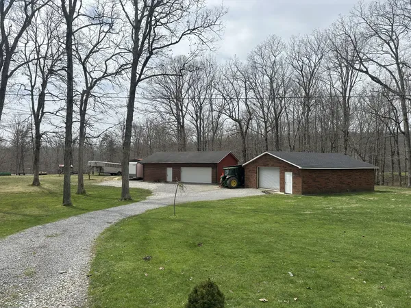 a house with trees in the background