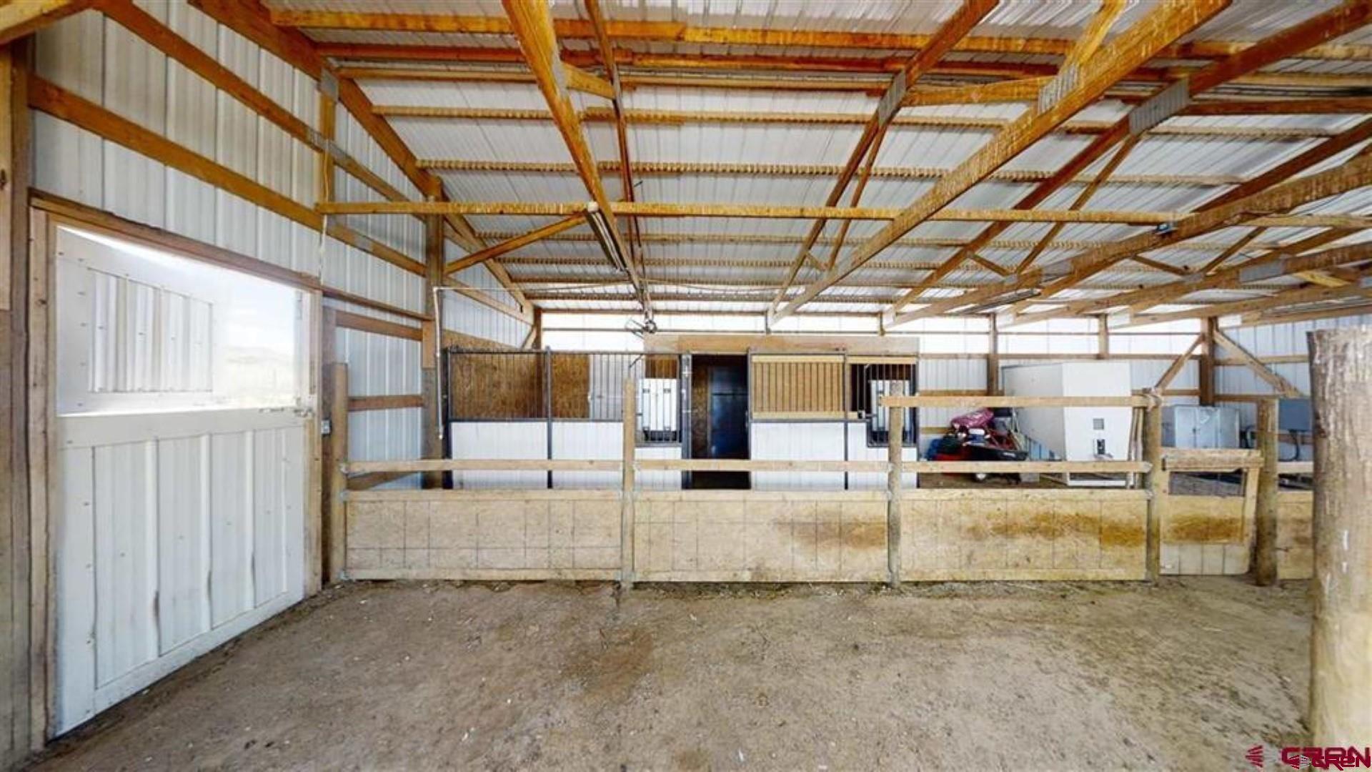 15423 2525th Road Cedaredge, CO 81413 - Photo 33 of 35 a view of a room with wooden walls