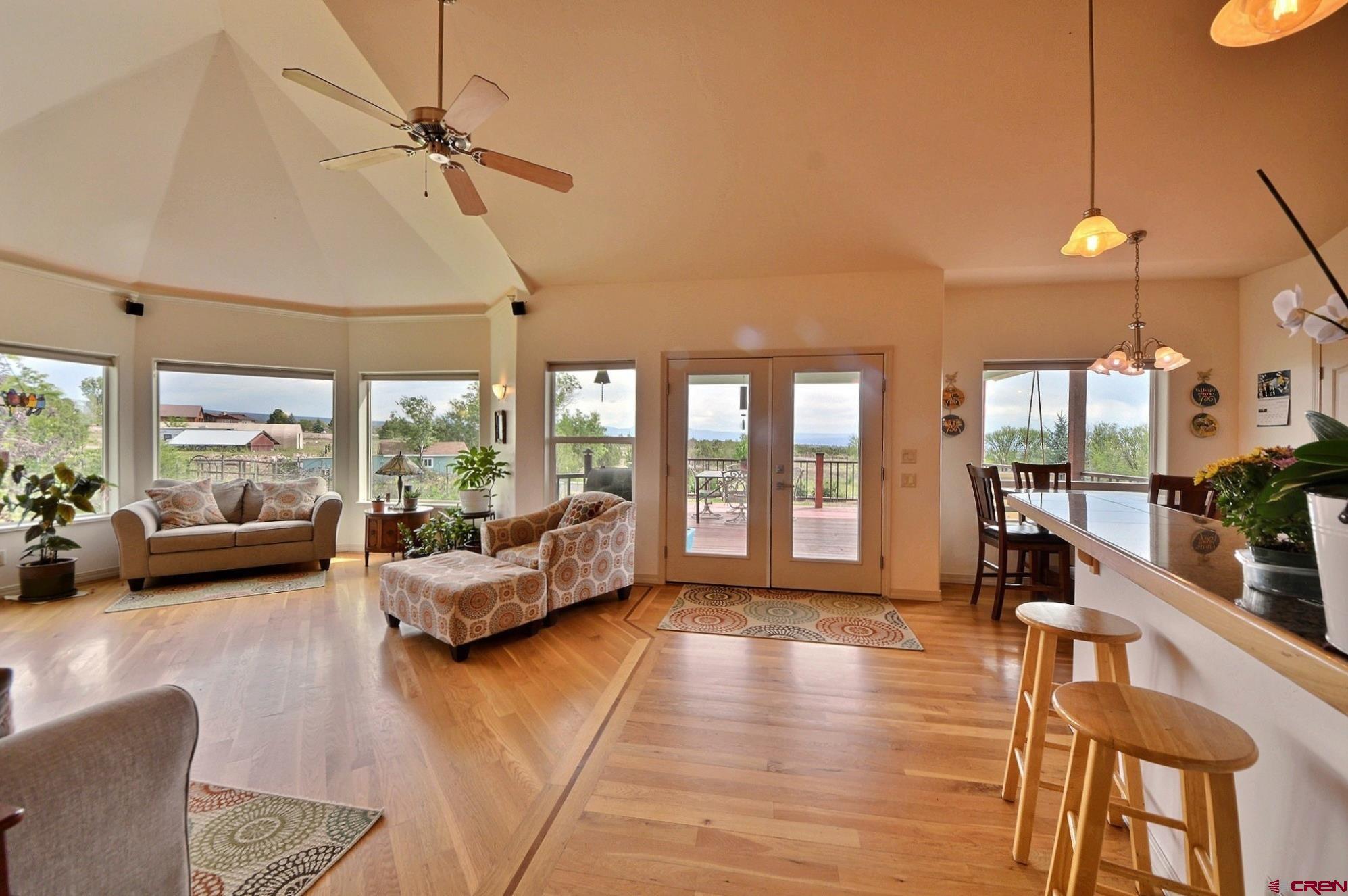 15423 2525th Road Cedaredge, CO 81413 - Photo 4 of 35 a living room with furniture and a large window