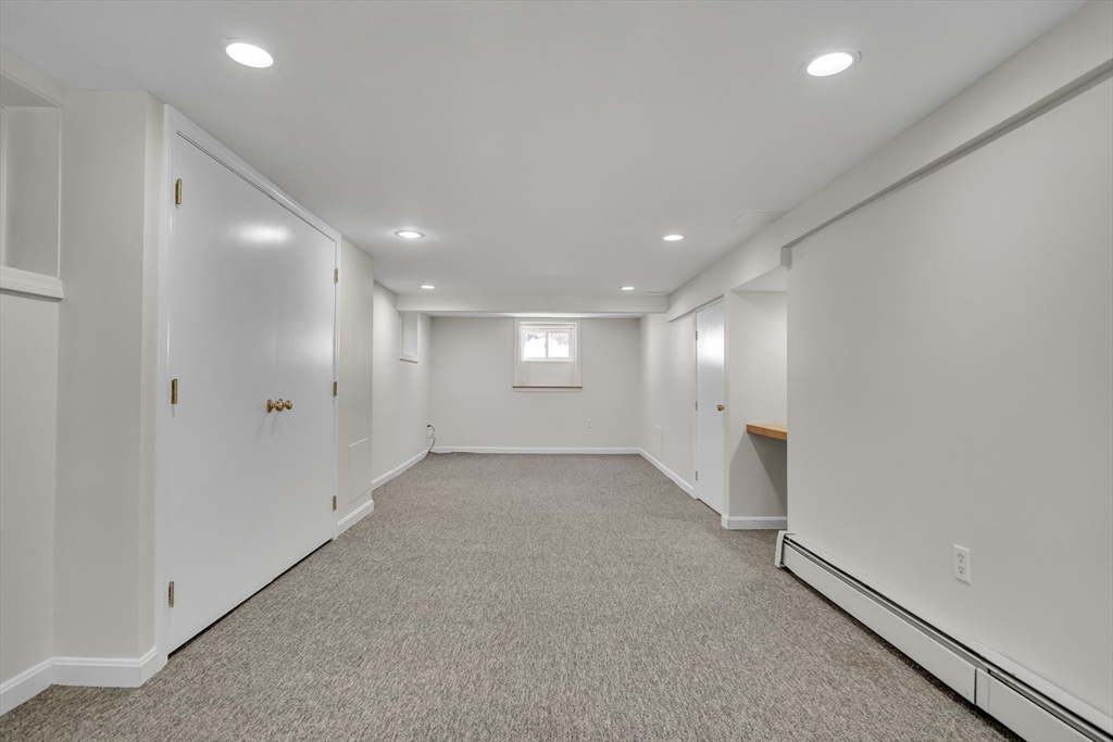 10 Dexter Road Lexington, MA 02420 - Photo 25 of 30 an empty room with windows