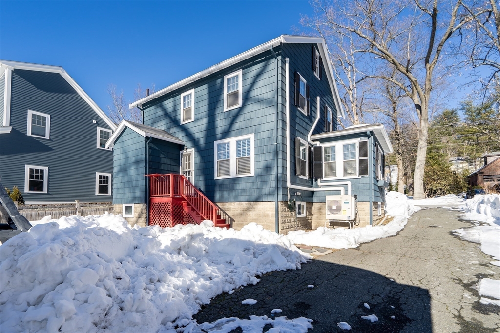 10 Dexter Road Lexington, MA 02420 - Photo 28 of 30 a view of a house with snow on the road