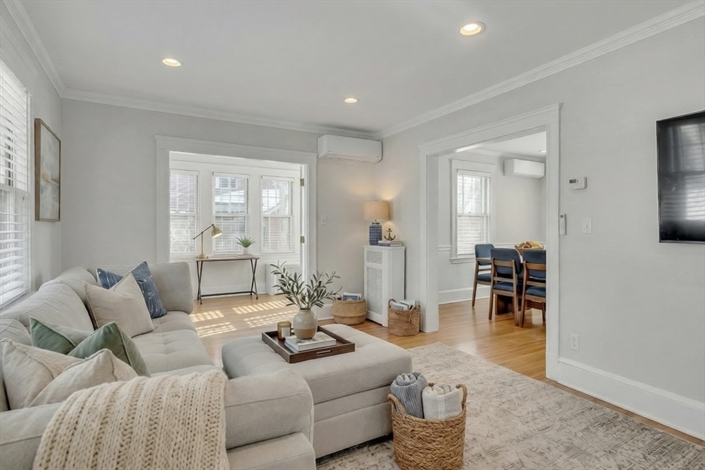 10 Dexter Road Lexington, MA 02420 - Photo 7 of 30 a living room with furniture and a table