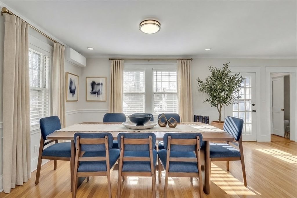 10 Dexter Road Lexington, MA 02420 - Photo 10 of 30 a view of a dining room with furniture window and wooden floor