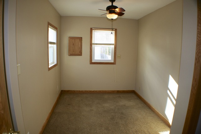 933 Wisconsin Road New Lenox, IL 60451 - Photo 13 of 16 an empty room with a window