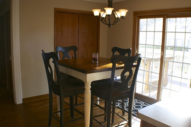 933 Wisconsin Road New Lenox, IL 60451 - Photo 8 of 16 a view of a dining room with furniture a chandelier and wooden floor