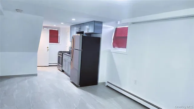 a bathroom with a toilet sink and shower