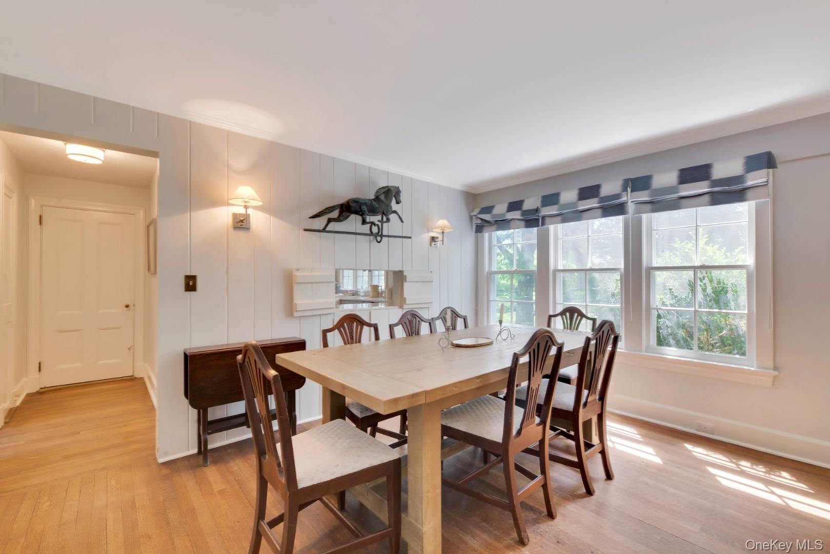90 Old Depot Road Quogue, NY 11959 - Photo 5 of 21 a view of a dining room with furniture and window
