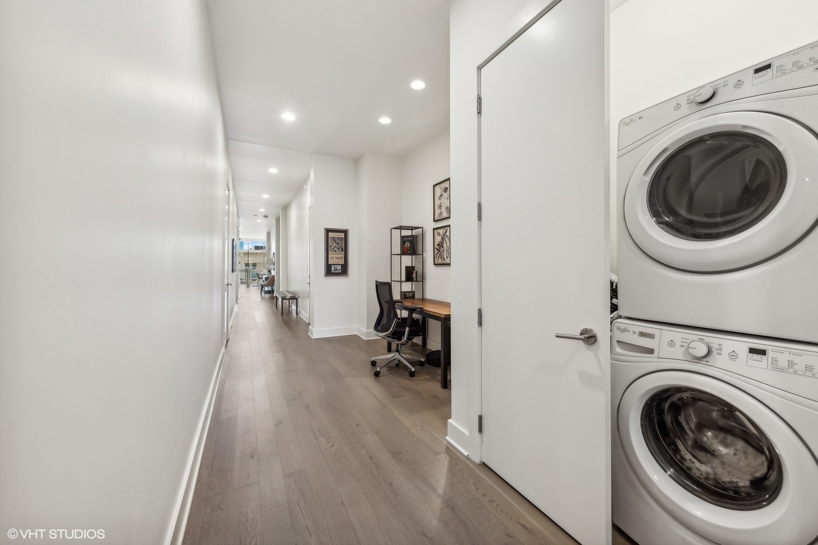 1128 West Adams Street, Unit 4E Chicago, IL 60607 - Photo 13 of 21 a view of a hallway with washer and dryer