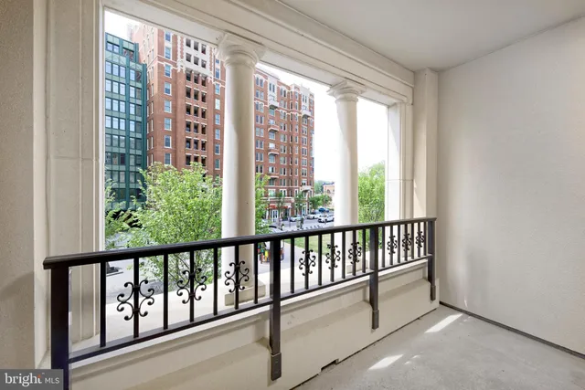 a view of a porch with wooden floor