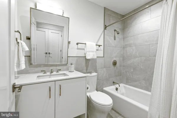 a view of a storage & utility room with washer and dryer