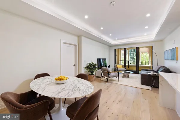 a living room with furniture and window
