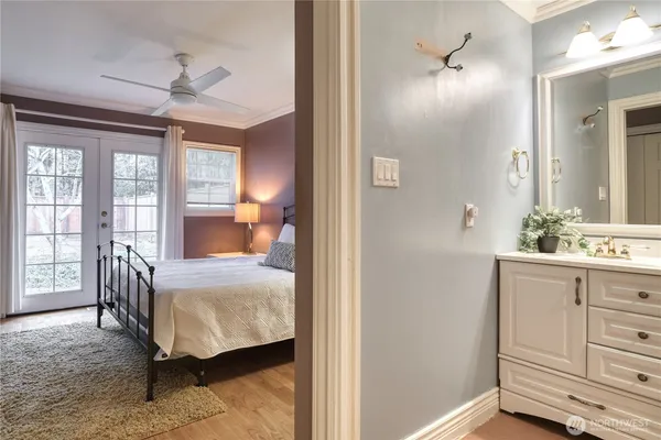 a bedroom with a bed and a dresser
