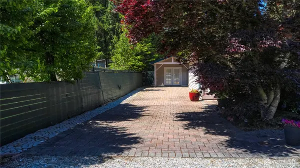 a view of backyard with green space