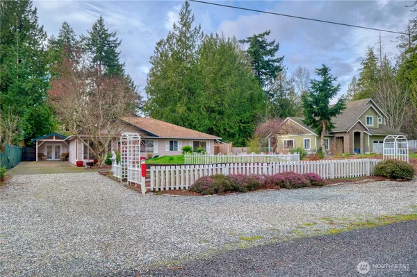 front view of a house with a yard