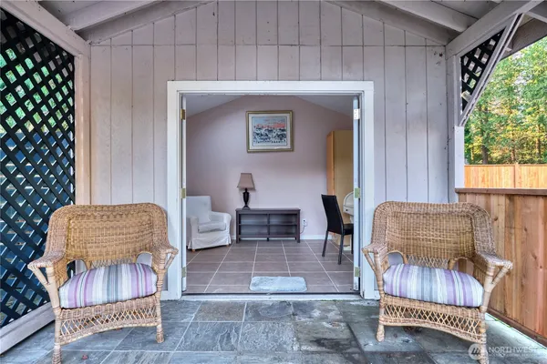 a living room with furniture and a window