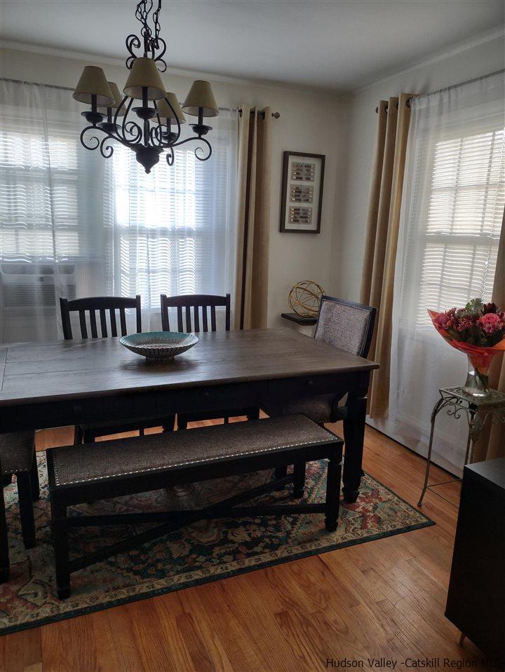 685 Churchland Road Saugerties, NY 12477 - Photo 13 of 30 a view of a dining room with furniture window and wooden floor