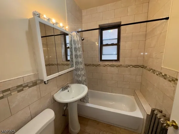 a bathroom with a sink and a bathtub