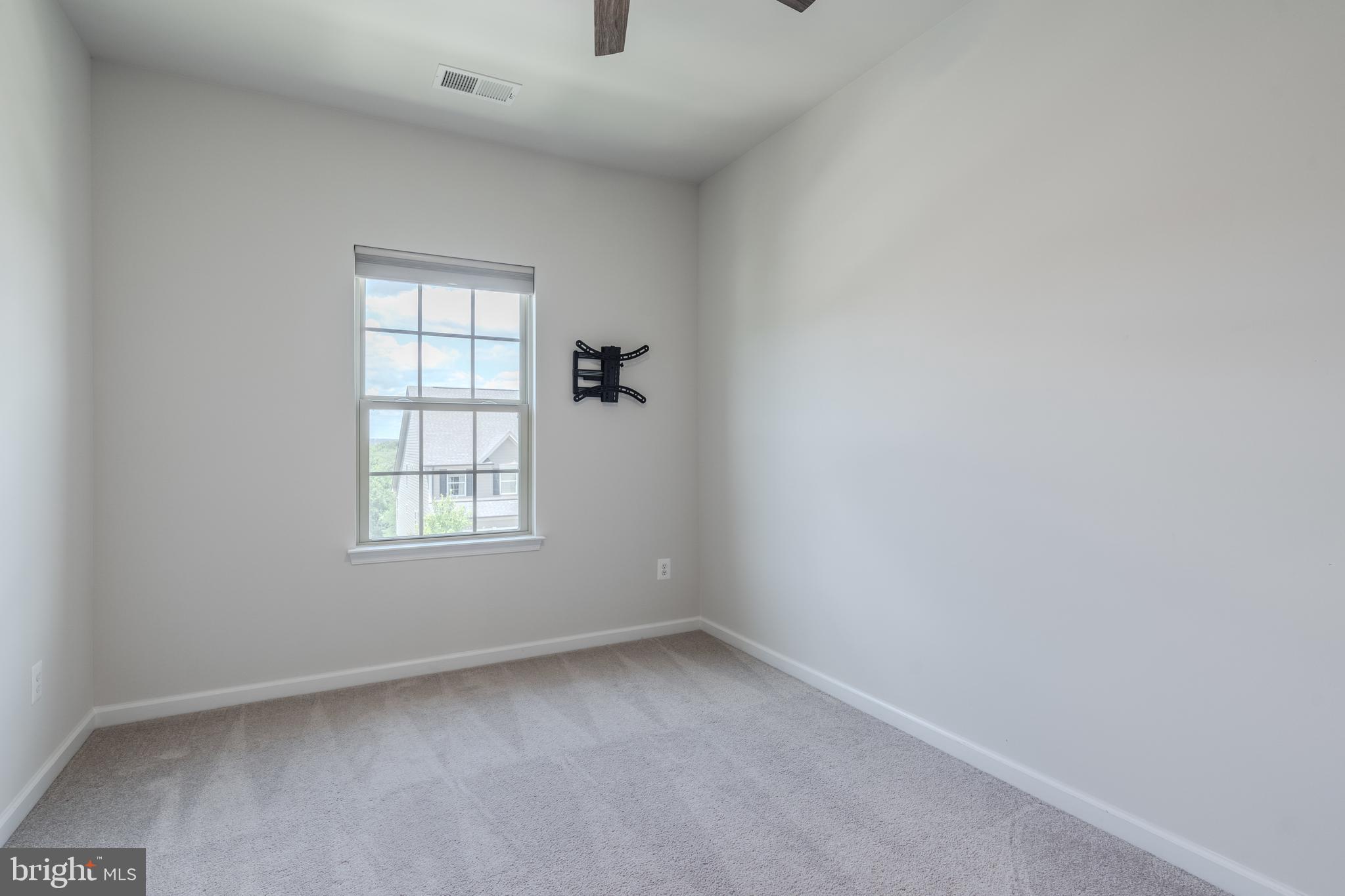 18191 Red Mulberry Road Dumfries, VA 22026 - Photo 34 of 42 an empty room with windows