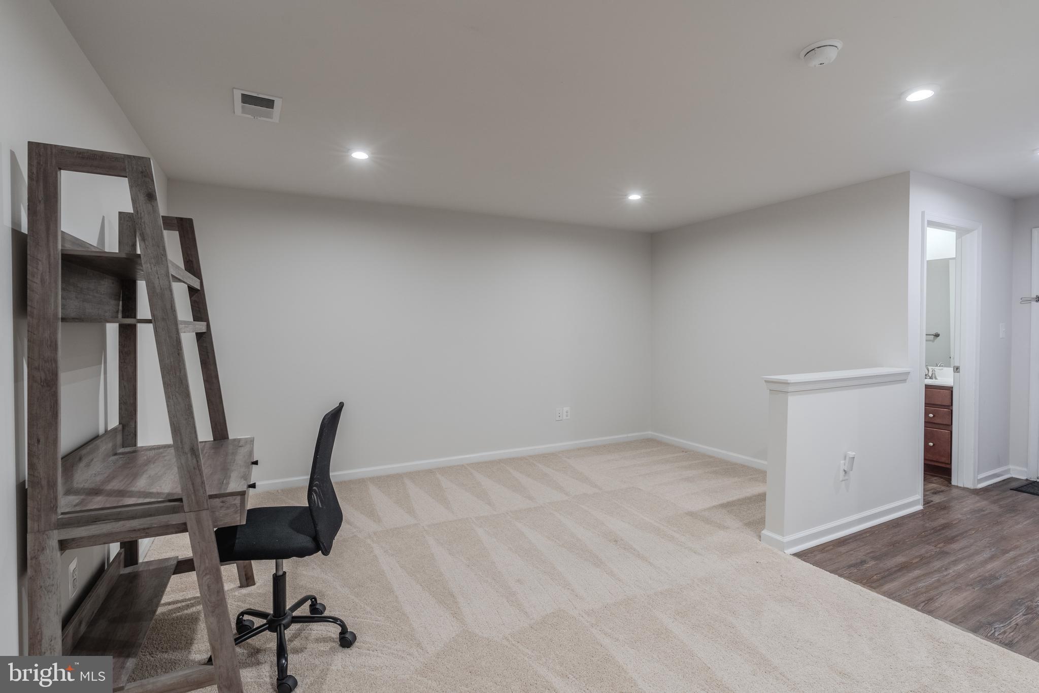 18191 Red Mulberry Road Dumfries, VA 22026 - Photo 41 of 42 a view of a room with gym equipment